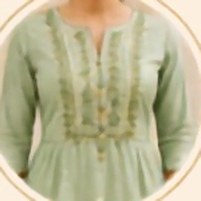 A pale green kurta with an embroidered yoke